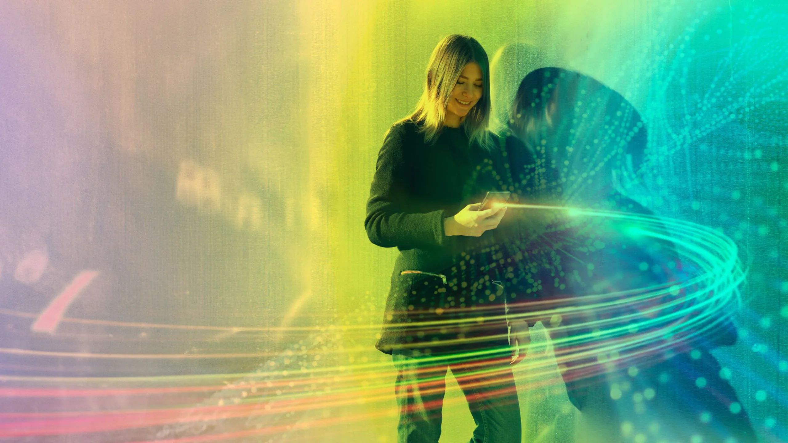 A woman standing against a wall, looking at her mobile phone with light lines streaking out of the device. The image relates to the article 'AI for IA: Enabling Artificial Intelligence for Intelligent Augmentation of Business.'
